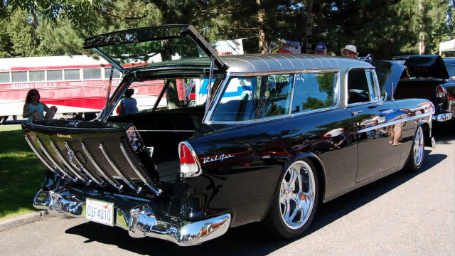 Black car surfboard man standing free wallpaper - medium preview image