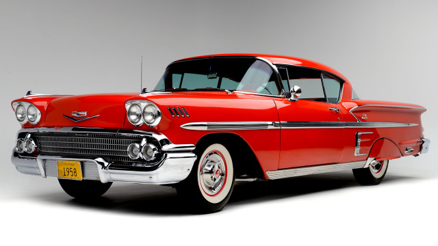 Red classic car studio photo free wallpaper - medium preview image