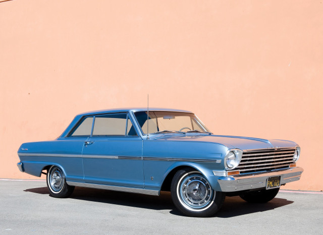 Blue car parked building tan free wallpaper - medium preview image