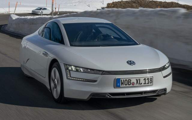 White car driving snow covered free wallpaper - medium preview image