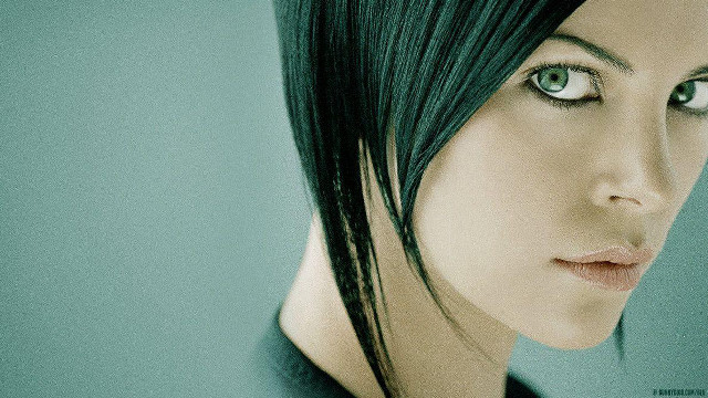 Green haired android serious portrait free wallpaper - medium preview image