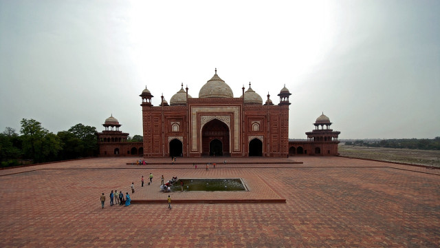 Large building people brick floored free wallpaper - medium preview image