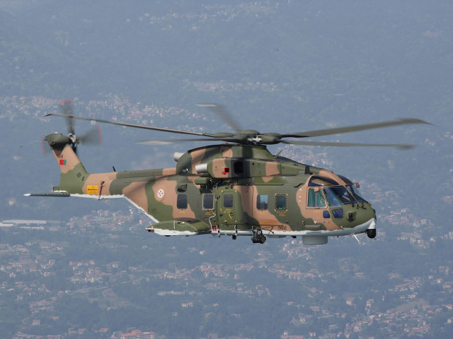 Military helicopter flying city sky free wallpaper - medium preview image