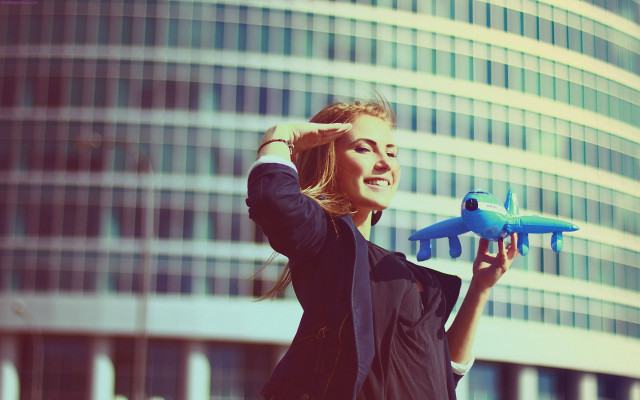 Woman toy airplane glass window free wallpaper - medium preview image