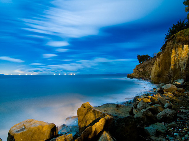 Rocky beach cliff night blue free wallpaper - medium preview image