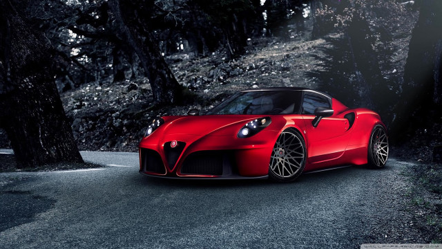 Red sports car parked woods free wallpaper - medium preview image