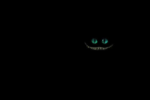 Black background green face glowing free wallpaper - medium preview image