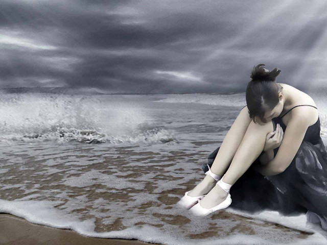 Woman beach feet water storm free wallpaper - medium preview image