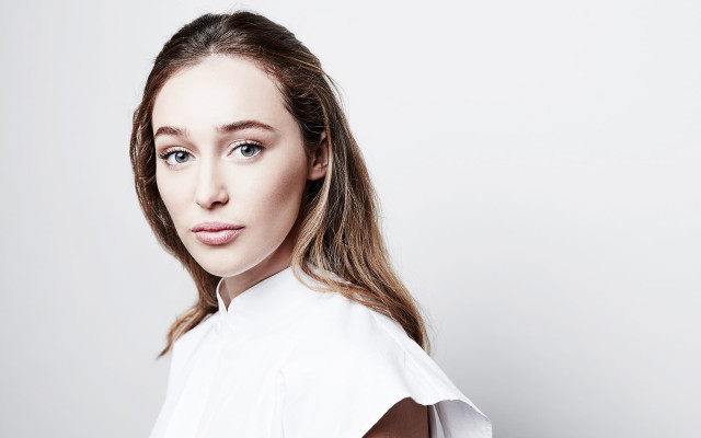 Woman white shirt ponytail posing free wallpaper - medium preview image