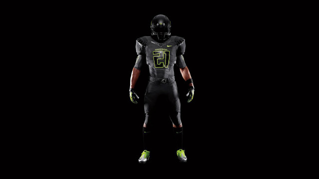 Football player neon green shoes free wallpaper - medium preview image