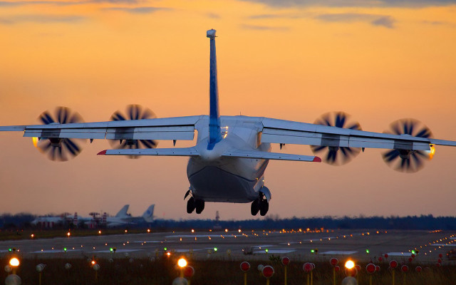 Plane taking off runway sunset free wallpaper - medium preview image