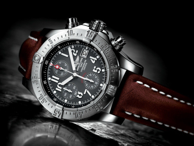 Watch red strap black surface free wallpaper - medium preview image