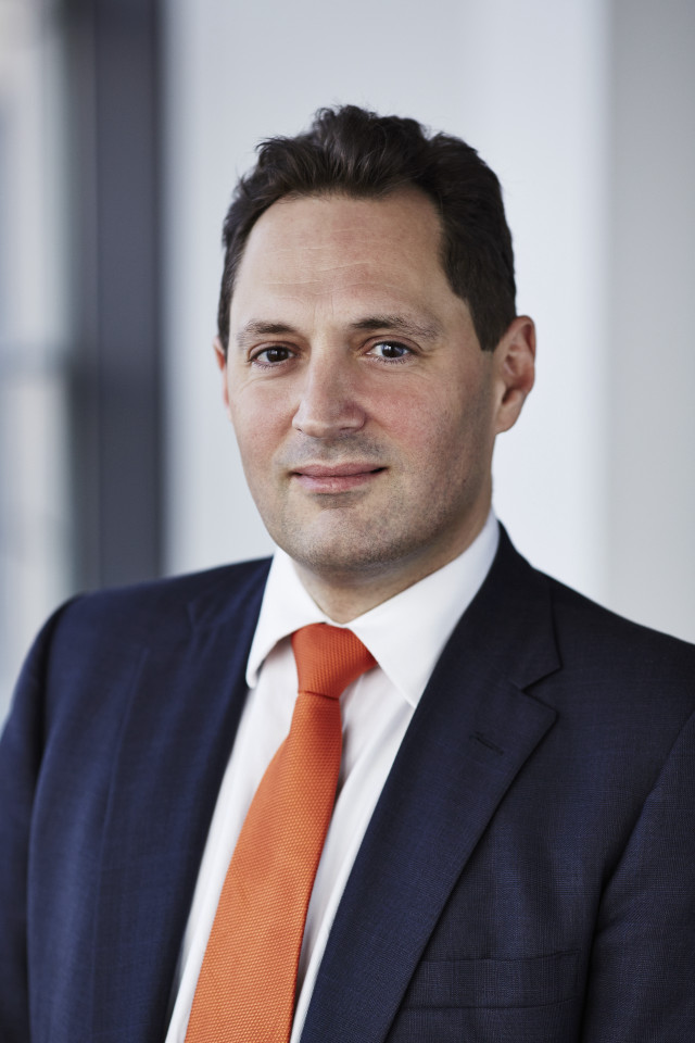 Man in suit orange tie free wallpaper - medium preview image