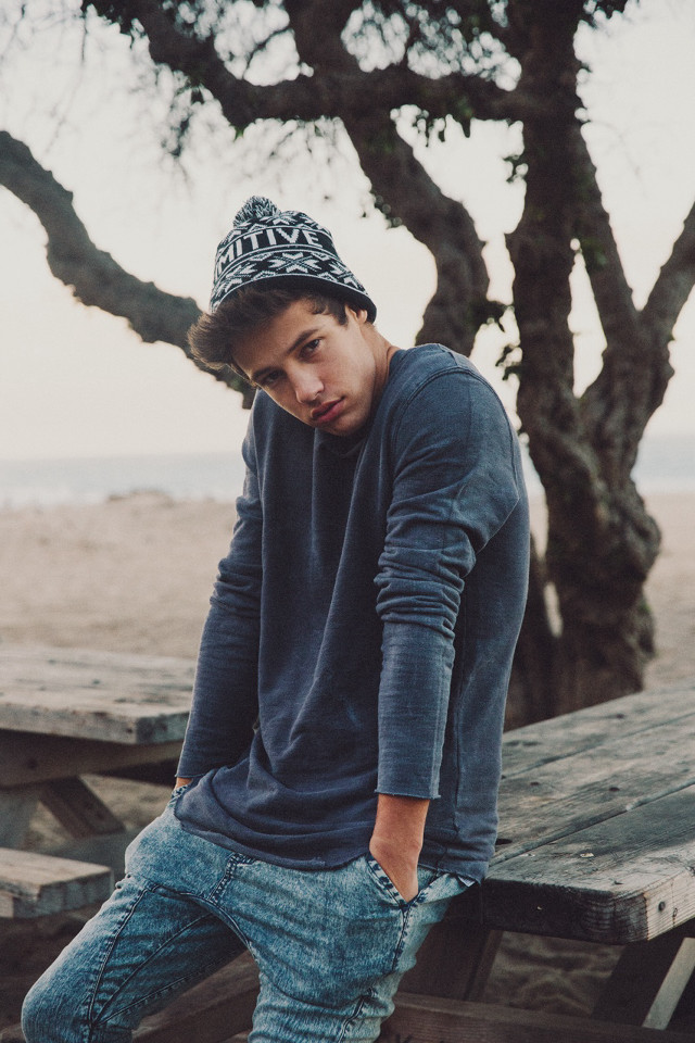 Young man picnic table hat free wallpaper - medium preview image