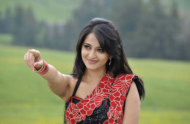 Woman red black dress pointing free wallpaper - medium preview image