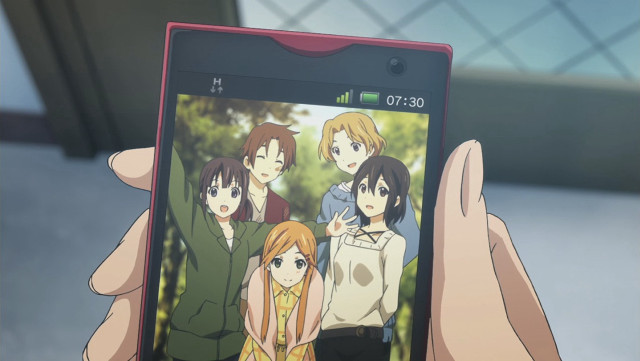 Person holding cell phone anime free wallpaper - medium preview image