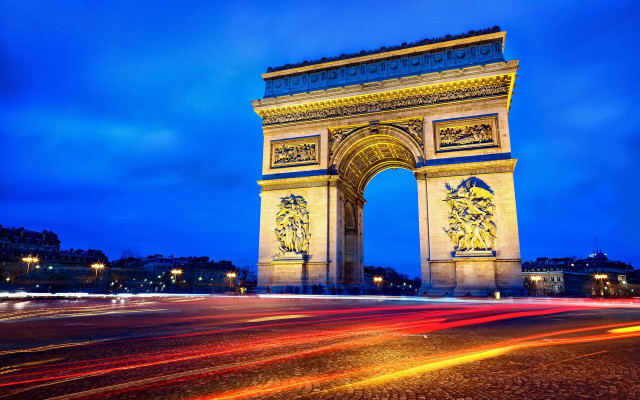 Tall ornate monument clock night free wallpaper - medium preview image