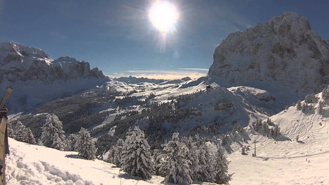 Snowboarder snowy mountain slope sun free wallpaper - medium preview image