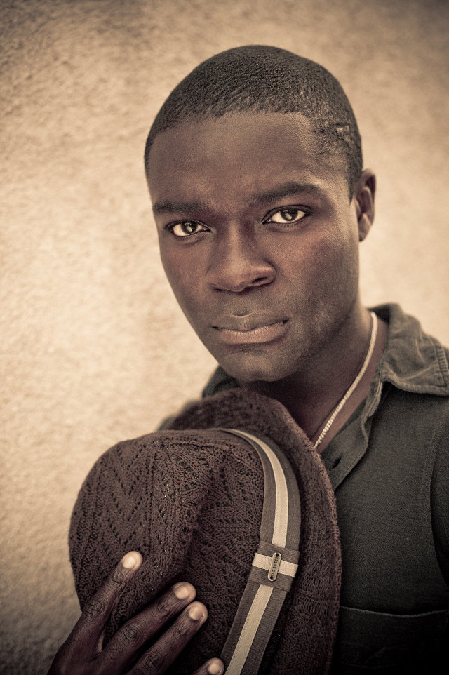 Man hat sweater posing picture free wallpaper - medium preview image