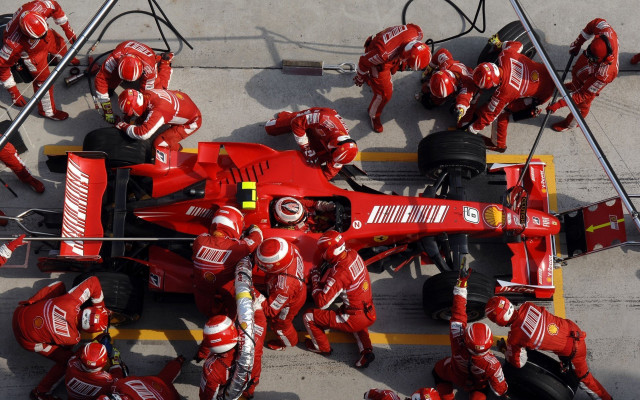 Mechanics working race car pit free wallpaper - medium preview image