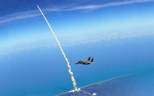 Jet rocket flying ocean sky free wallpaper - medium preview image