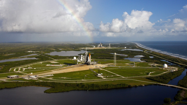 Rainbow field rocket sky above free wallpaper - medium preview image