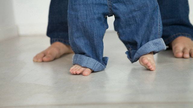 Person standing shiny surface feet free wallpaper - medium preview image
