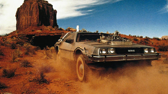 Car desert rocks sky clouds free wallpaper - medium preview image