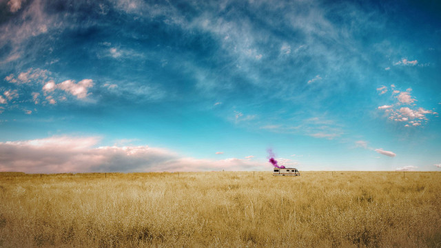 Truck driving field sky background free wallpaper - medium preview image