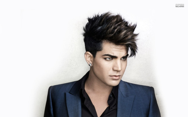 Mohawk suit jacket man posing free wallpaper - medium preview image