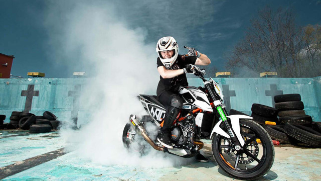 Man motorcycle dirt field blue free wallpaper - medium preview image