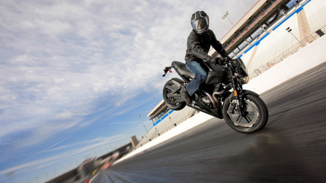 Man motorcycle track sky background free wallpaper - medium preview image