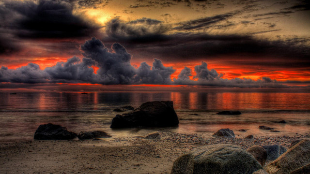 Sunset beach rocks water cloudy free wallpaper - medium preview image
