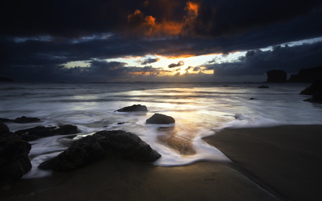 Sunset ocean rocks dark sky free wallpaper - medium preview image