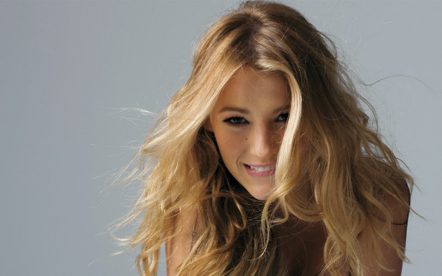 Woman blonde hair wind smiling free wallpaper - medium preview image