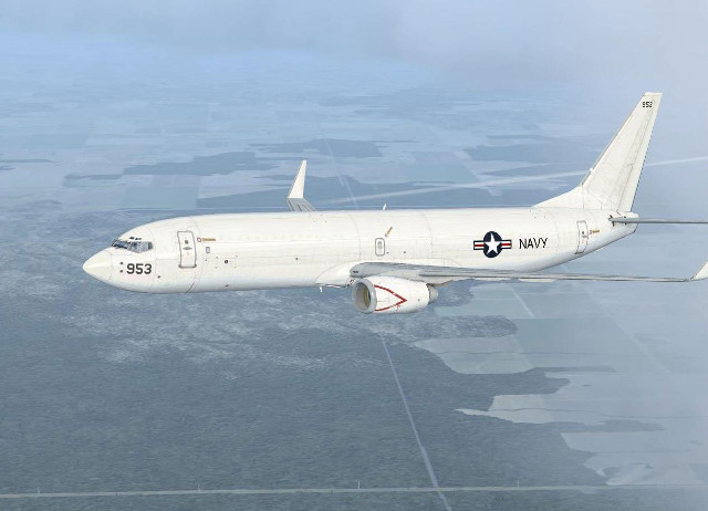 Large airplane flying over lush free wallpaper - medium preview image