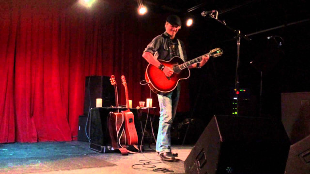 Man stage guitar microphone performance free wallpaper - medium preview image