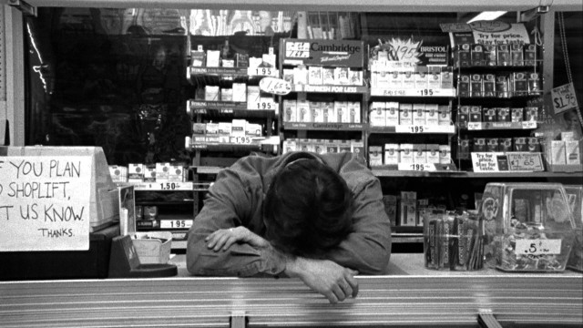 Man sitting counter store head free wallpaper - medium preview image