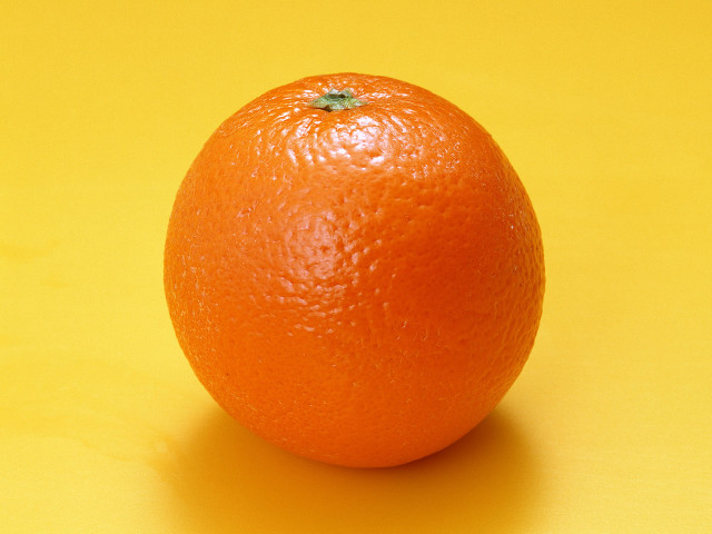 Orange yellow surface green spot free wallpaper - medium preview image