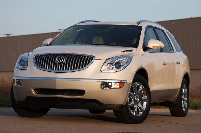 Silver suv building brown fence free wallpaper - medium preview image