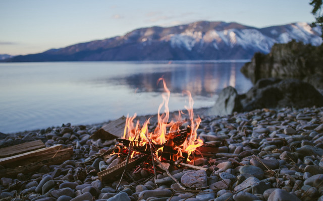 Campfire rocky beach lake mountains #2 free wallpaper - medium preview image