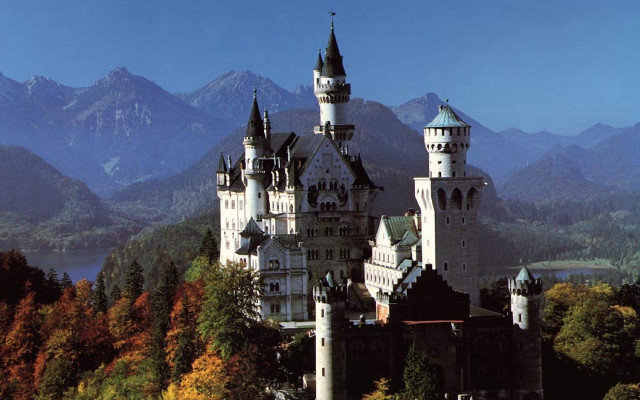 Castle tower clock mountains trees free wallpaper - medium preview image
