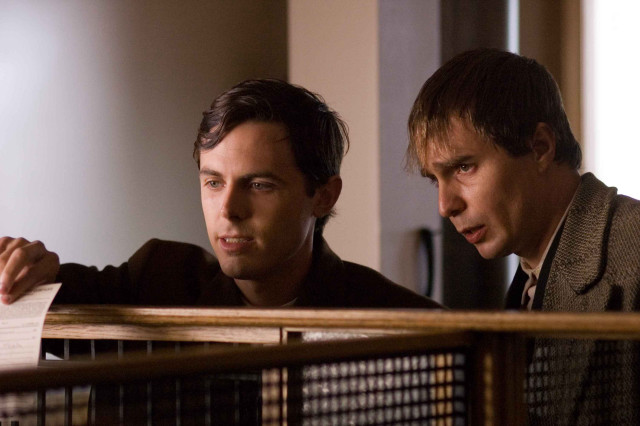Two men looking caged area free wallpaper - medium preview image