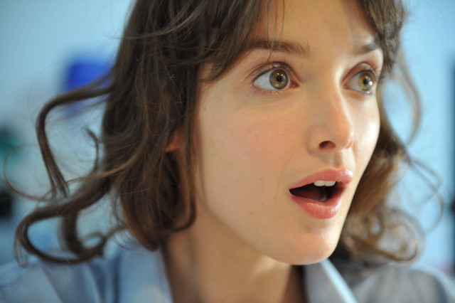 Surprised woman toothbrush mouth expression #2 free wallpaper - medium preview image