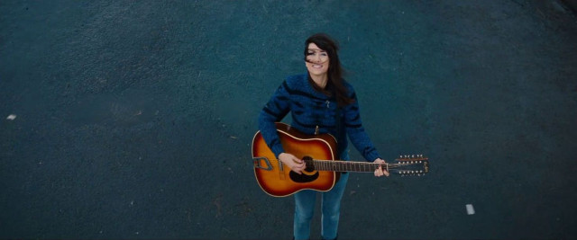 Woman holding guitar blue black free wallpaper - medium preview image