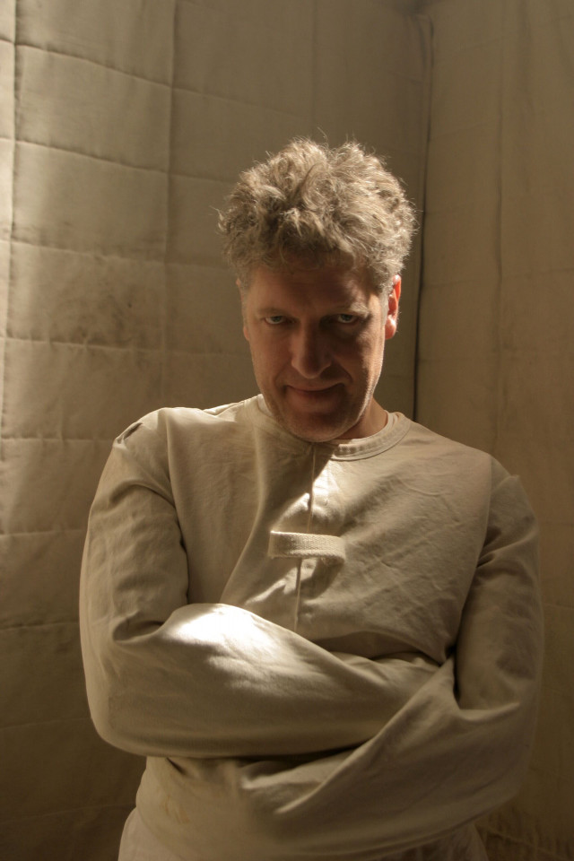Man white shirt crossed arms free wallpaper - medium preview image