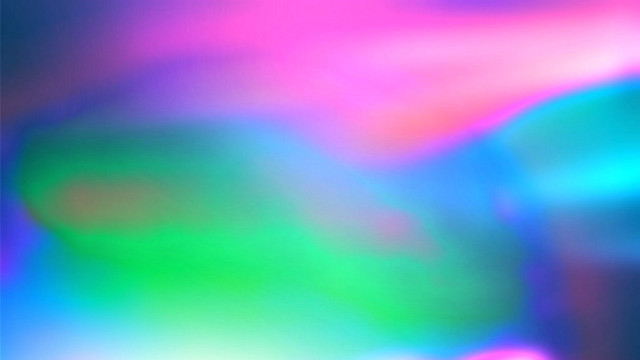 Blurry person holding cell phone free wallpaper - medium preview image
