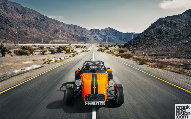 Motorcycle desert road mountains strike free wallpaper - medium preview image