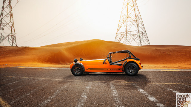 Orange car desert road power free wallpaper - medium preview image