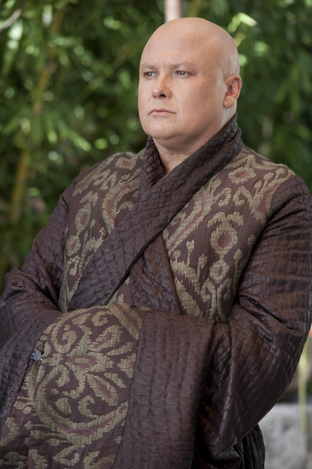 Bald man brown gold outfit free wallpaper - medium preview image